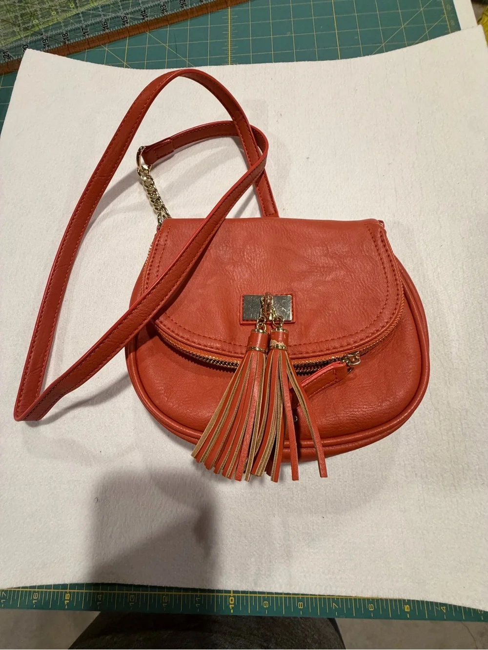 Crossbody Tassel Saddle Bag in pumpkin